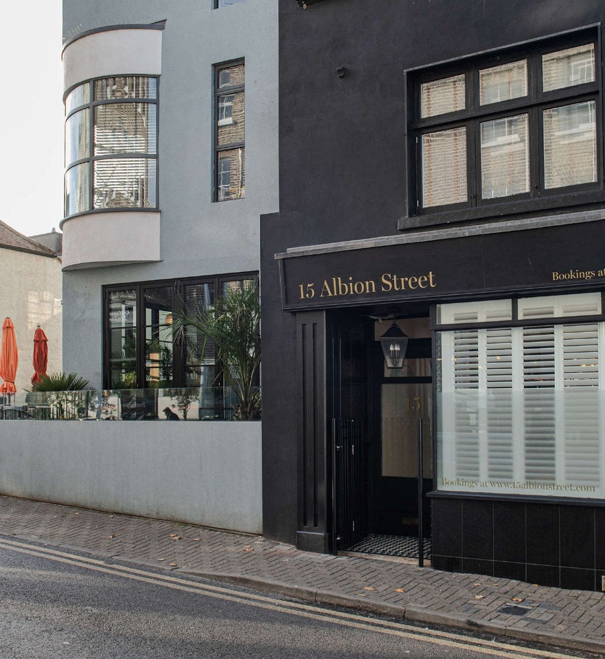 Exterior of 15 Albion Street showing the nearby private parking option for guests